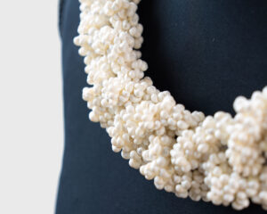 215 Triple Strand White Coral Lei Side 1
