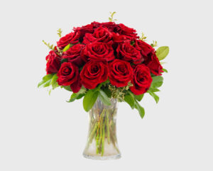 88 Vased Two Dozen Red LS Roses